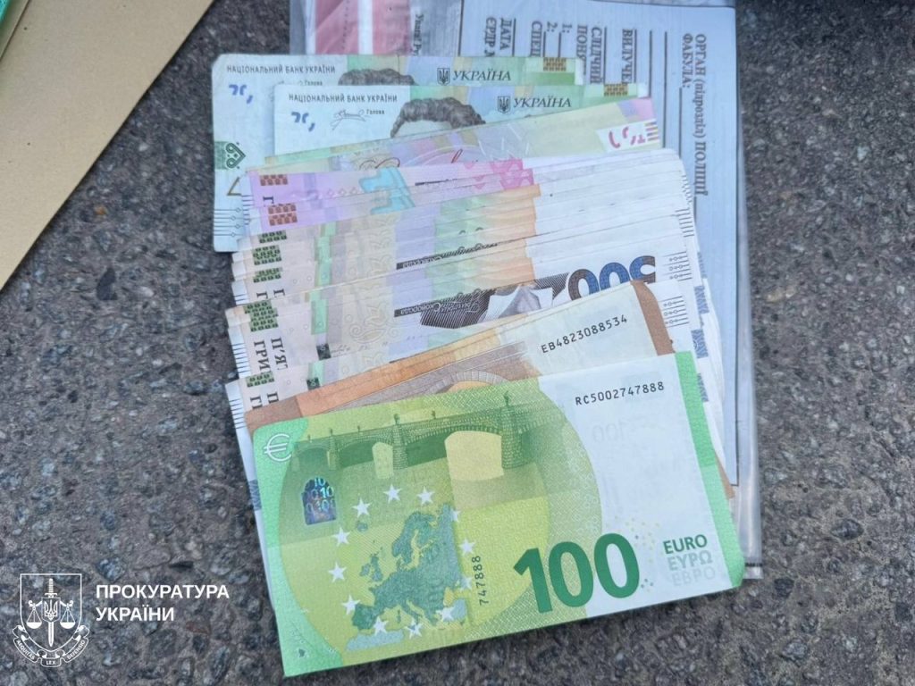 подозрение бывшему копу на Харьковщине